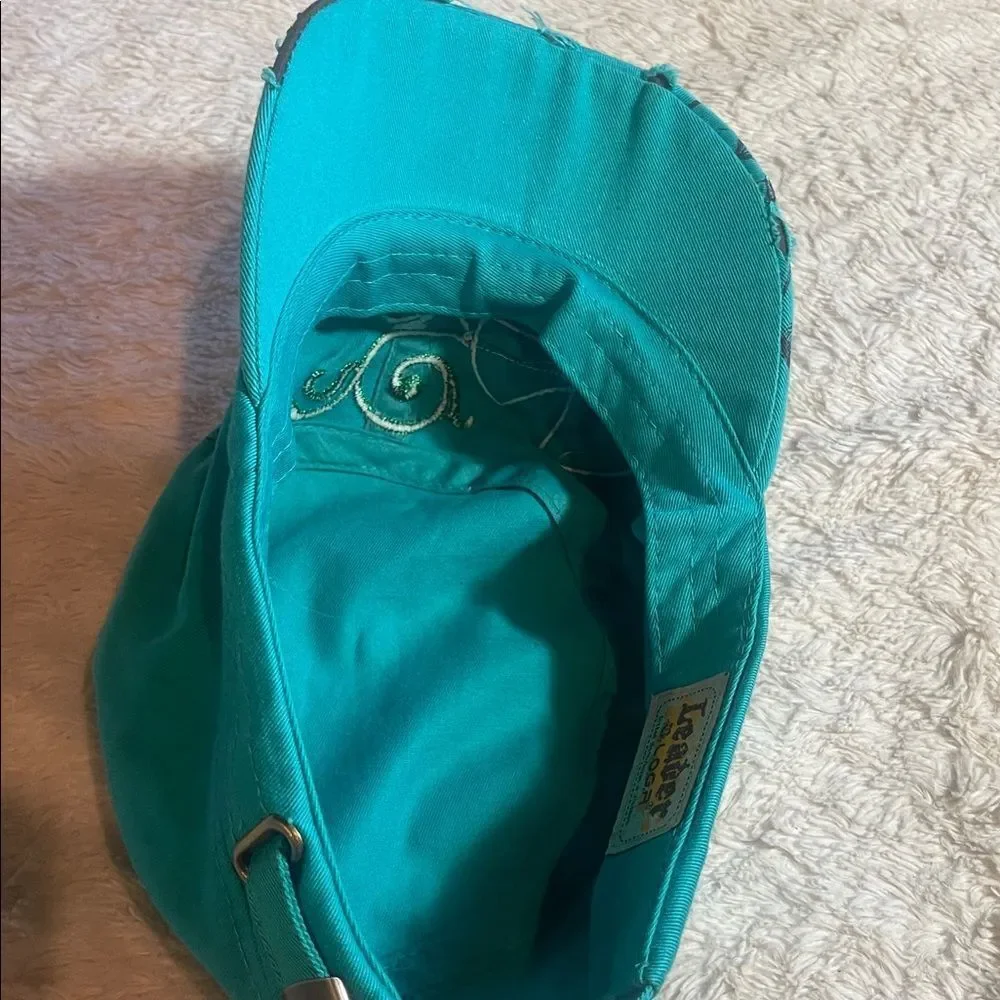 Teal Cap with Green Cross Design